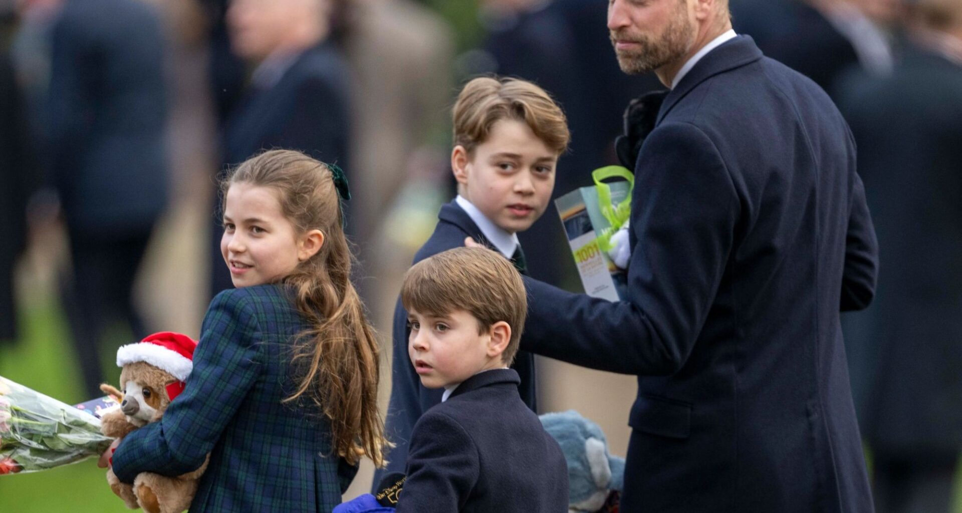Prince Louis follows in football-mad dad Wills' footsteps as he sports Aston Villa shirt during kick-about with mum Kate