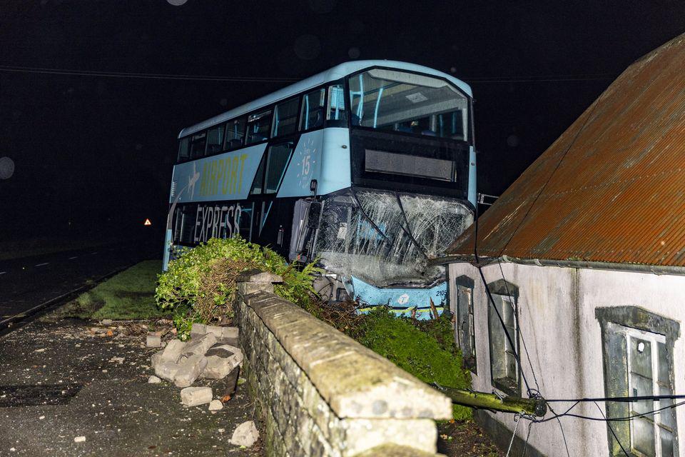 Bus crashes into building during storm