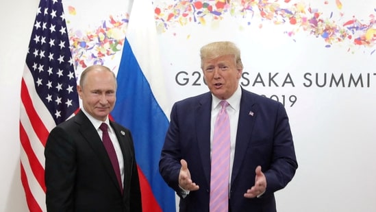 File photo of Russia's President Vladimir Putin and US President Donald Trump at a meeting on the sidelines of the G20 summit in Osaka, Japan June 28, 2019. (REUTERS)