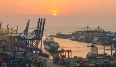 A containership arrives at the Port of Rotterdam
