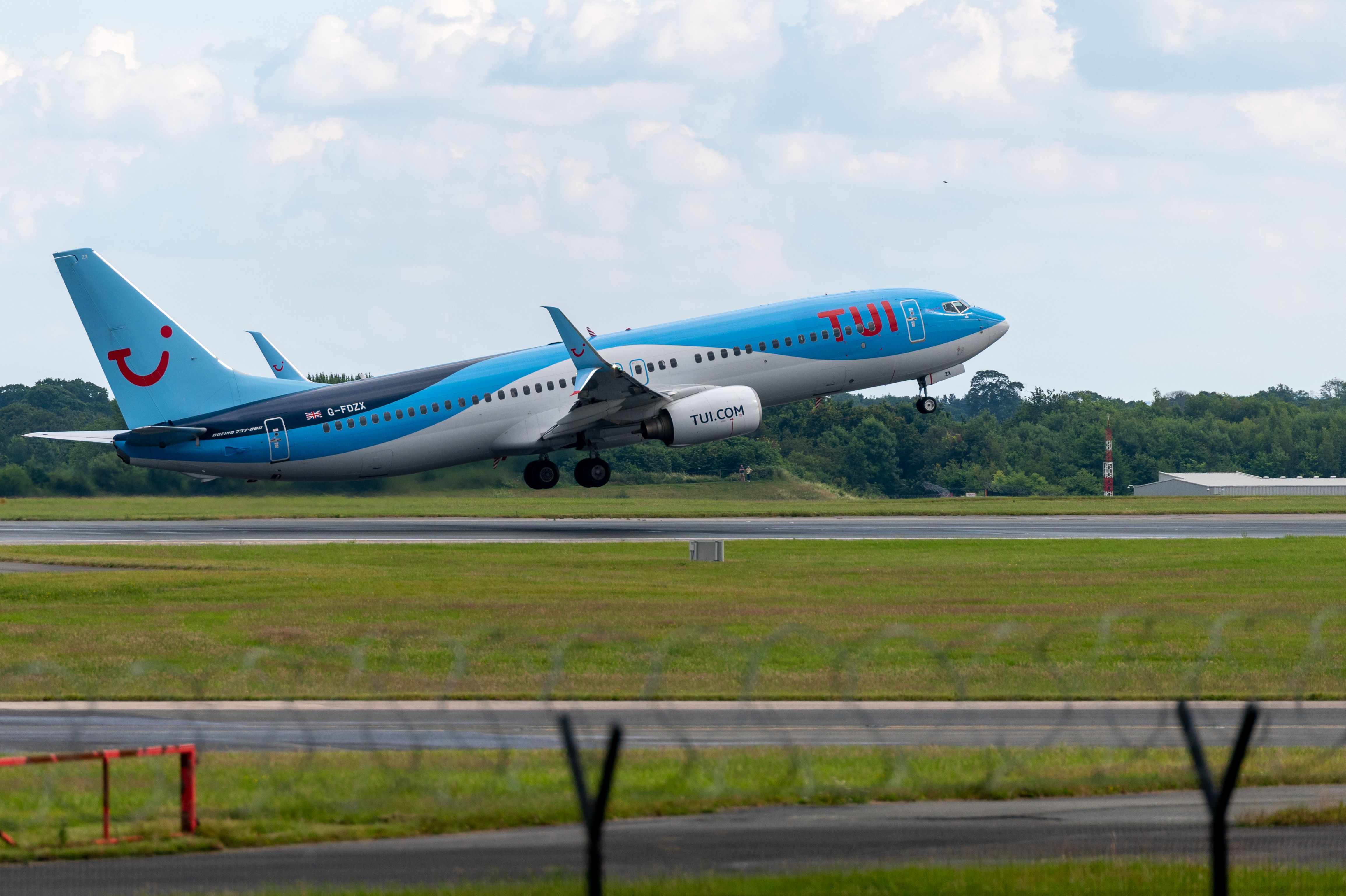 TUI Airways Boeing 737-800 departing Manchester Airport MAN shutterstock_2006020439