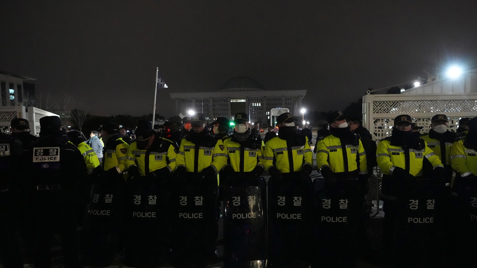 South Korean parliament votes to defy president by lifting his declaration of martial law