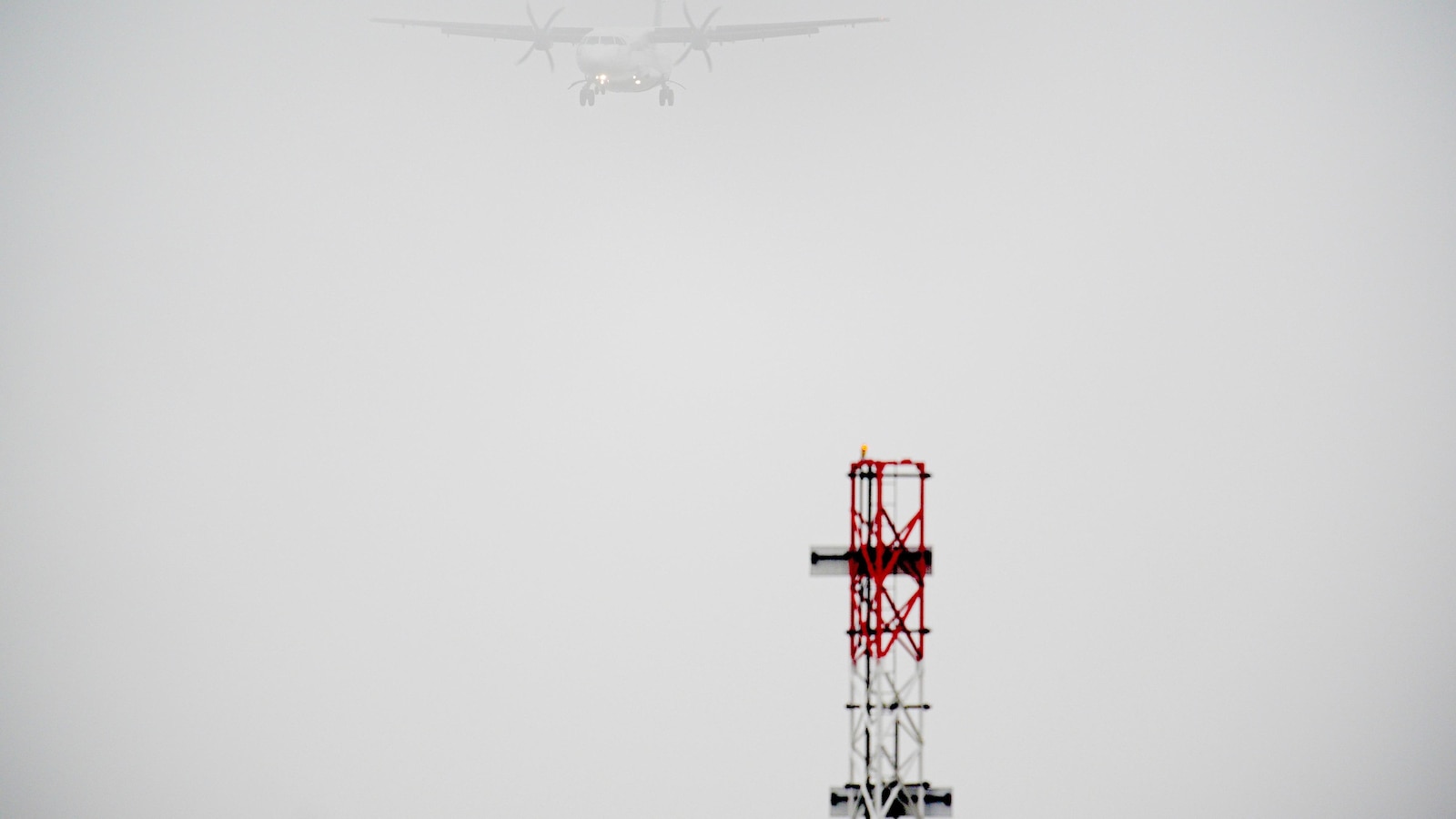 Thick fog disrupts some flights on one of the UK's busiest weekends for travel