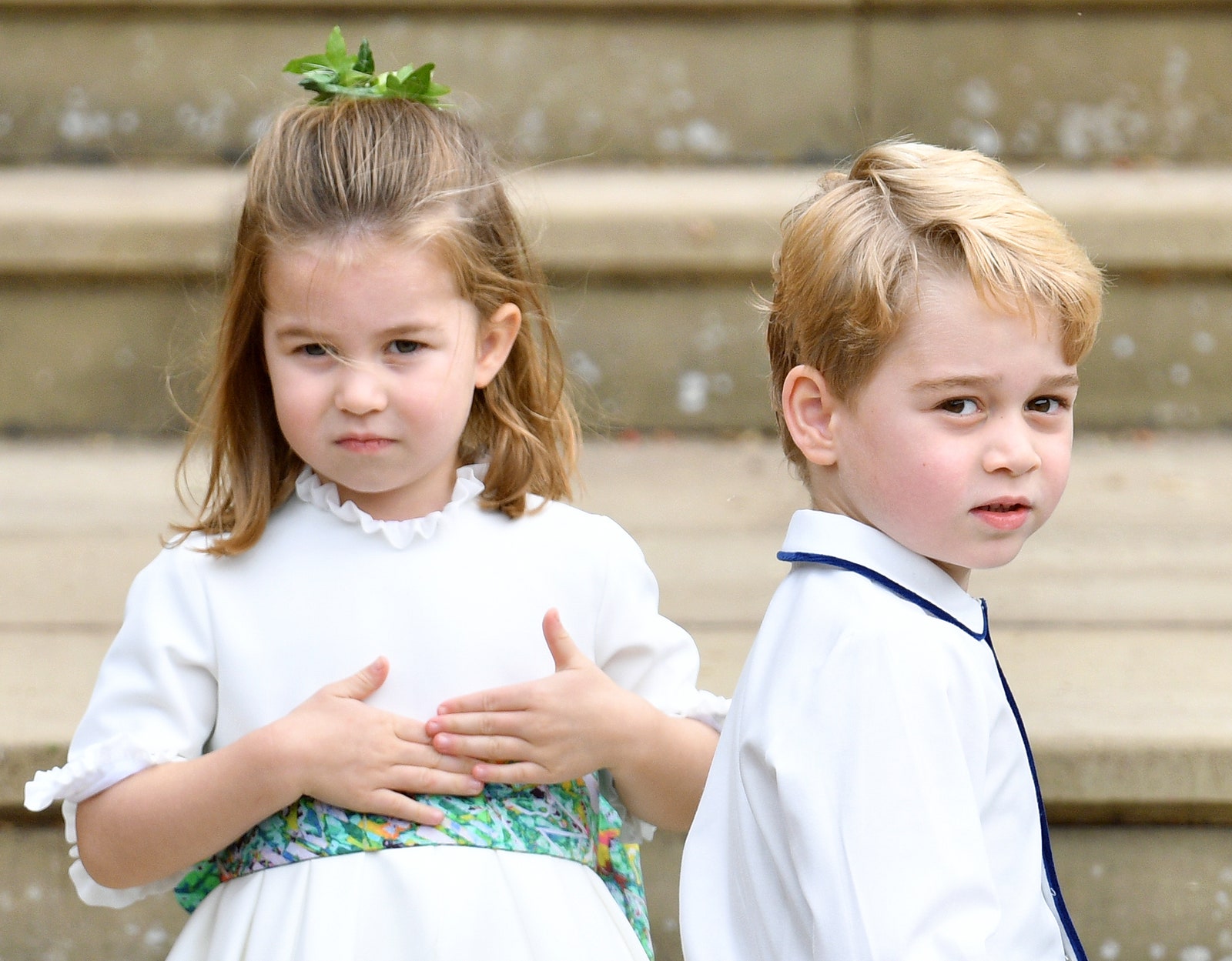 Image may contain Prince George of Cambridge Face Head Person Photography Portrait Clothing Dress and Body Part