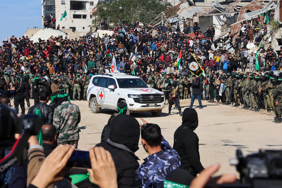 Four freed Israeli women hostages were home in Israel on January 25, ending more than 15 months of captivity after Hamas militants handed them over to the Red Cross under a truce deal in the Gaza war. (Omar Al-Qattaa / AFP - Getty Images)