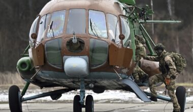 Russian Soldiers Boarding a Mi-8 Helicopter