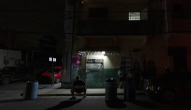 A generator powered lamp on a sidewalk in Puerto Rico.