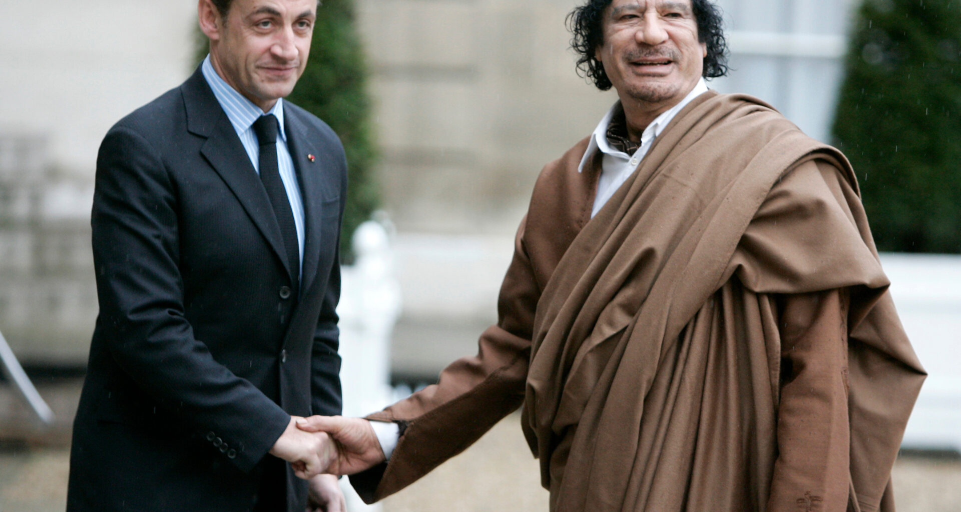Nicolas Sarkozy and Moammar Gadhafi