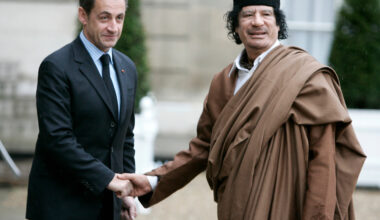 Nicolas Sarkozy and Moammar Gadhafi