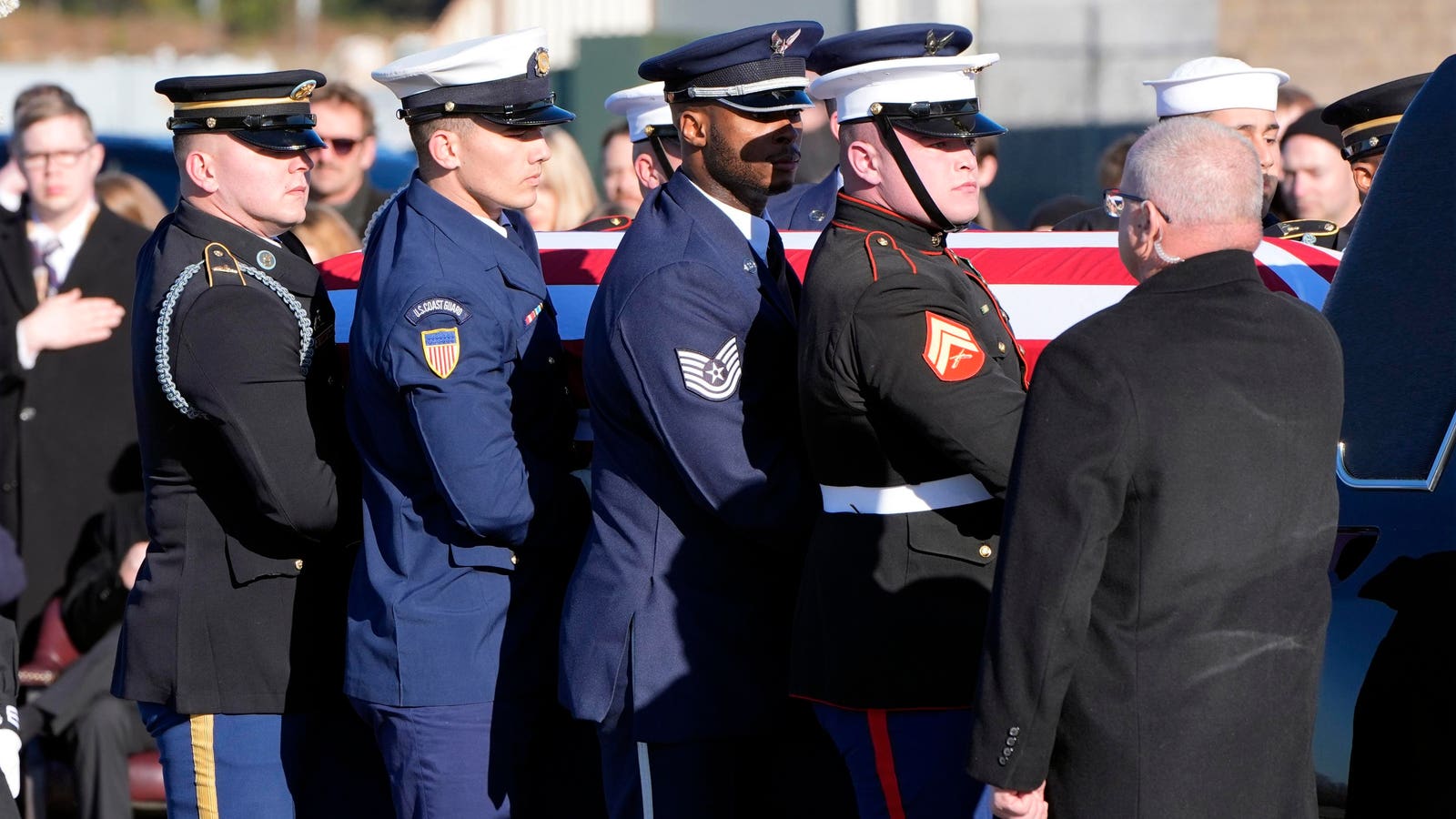 Casket Arrivces In Plains, Georgia, After Trump, Obama, Biden Attend Service