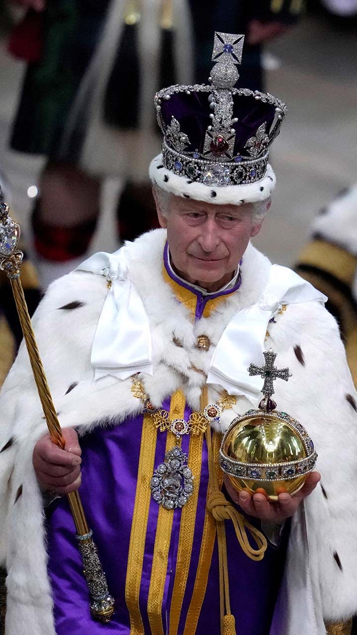 Britain's King Charles III walks in the Coronation Procession