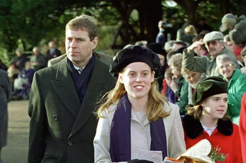Prince Andrew, the Duke of York, and his daughters by Sarah Ferguson, Princesses Beatrice and Eugenie attend Sandringham Church December 25, 2000