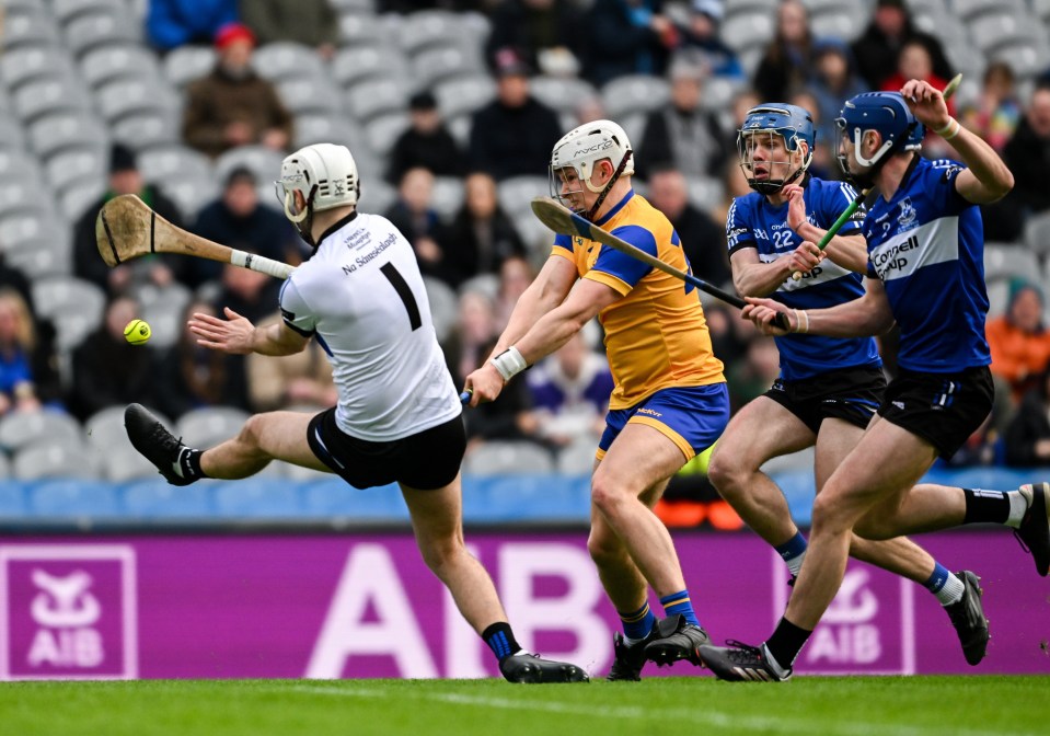 19 January 2025; Tom Brennan of Na Fianna scores his side's first goal past Sarsfields goalkeeper Ben Graham during the AIB GAA Hurling All-Ireland Senior Club Championship final match between Na Fianna and Sarsfields at Croke Park in Dublin. Photo by Daire Brennan/Sportsfile