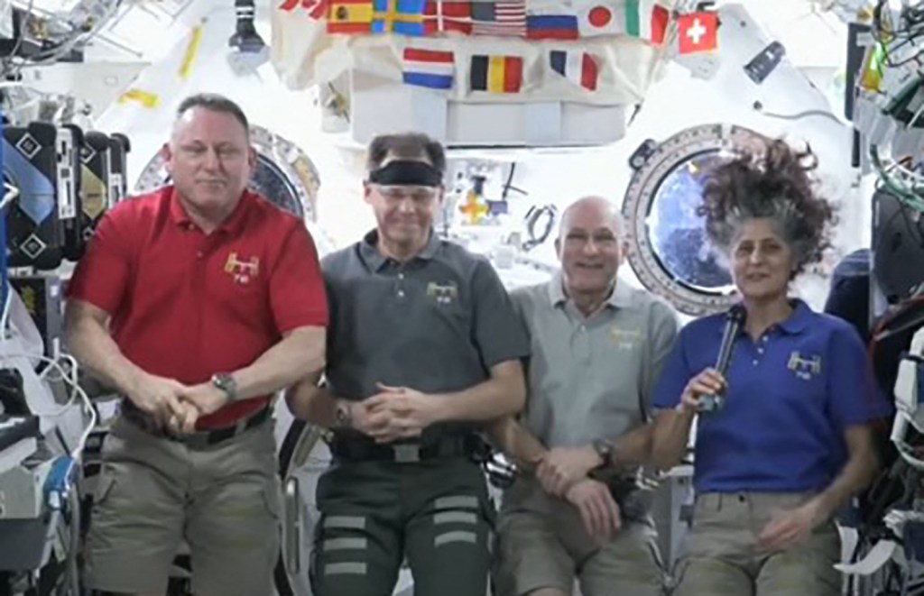 This image from a NASA video shows astronauts, from L to R, Butch Wilmore, Nick Hague, Don Pettit and Suni Williams aboard the International Space Station.