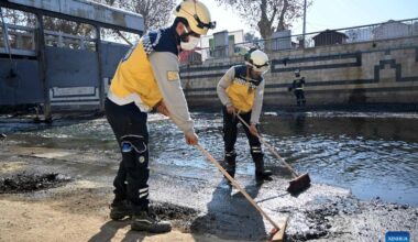 People take part in neighborhood cleaning campaign in Damascus, Syria-Xinhua
