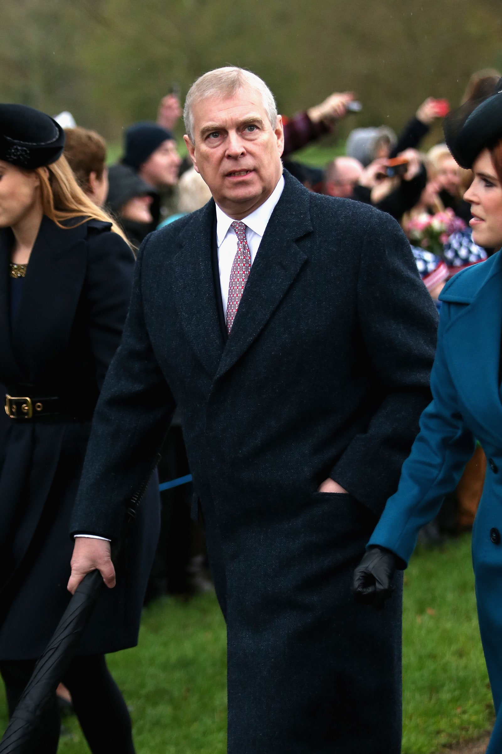 Image may contain Prince Andrew Duke of York Clothing Coat Person Glove Accessories Formal Wear Tie Hat and People