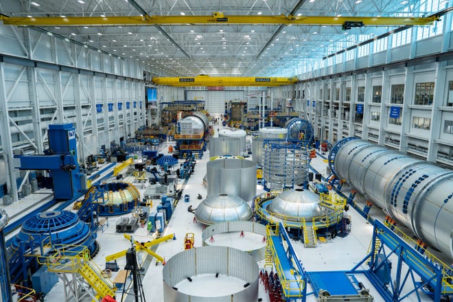 This photo provided by Blue Origin last year shows a rare glimpse inside the New Glenn manufacturing facility at the company's sprawling campus at Exploration Park on Merritt Island.