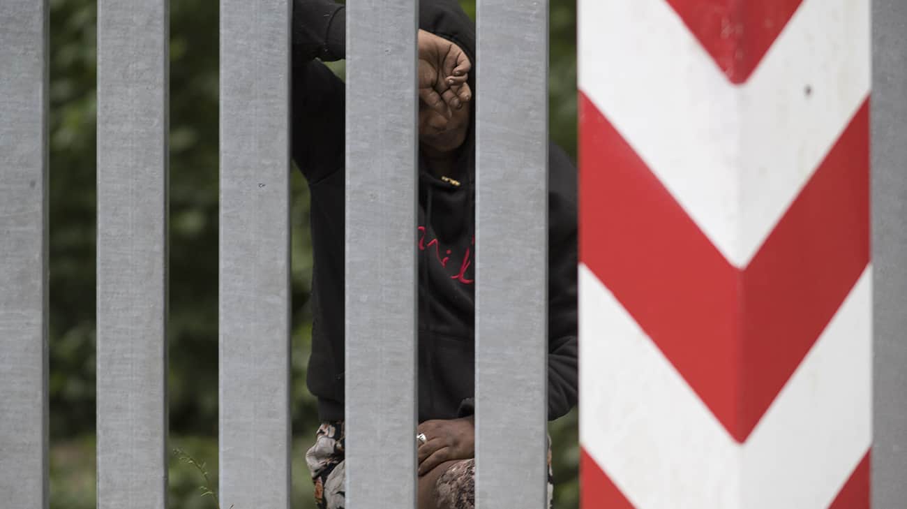 Polish border guards observe migrants being transported from Belarus towards Russia