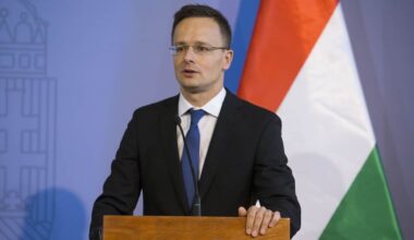 Hungary's foreign minister reiterates threat to block extension of sanctions against Russia