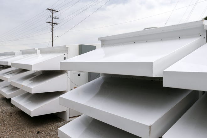 Structures housing Simple Mining's bitcoin mining machines are pictured Tuesday, Sept. 10, 2024 in Cedar Falls, Iowa.