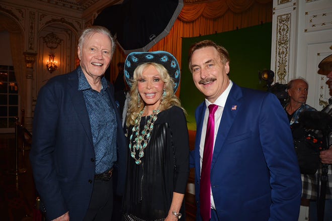 Jon Voight, Toni Holt Kramer and Michael Lindell attend "Country Comes To Mar-a-Lago" at in 2019 in Palm Beach, FL.