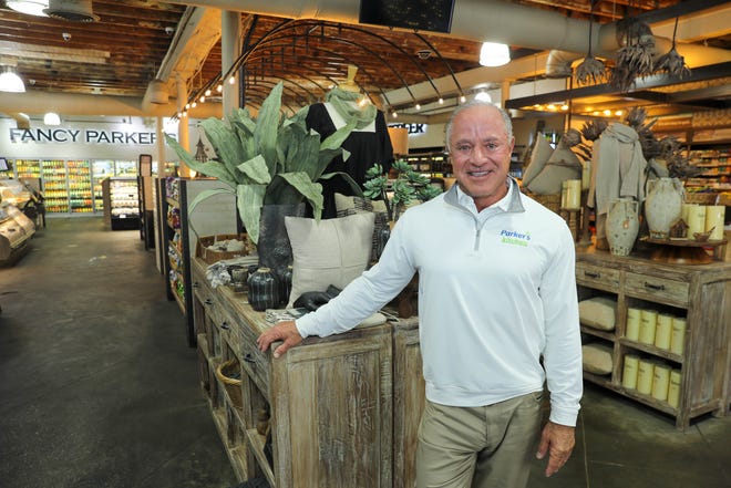 Parker's founder and CEO Greg Parker stands inside Fancy Parker's on Drayton Street in downtown Savannah.