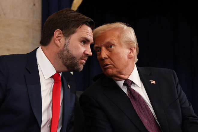 U.S. Vice President-elect former Sen. J.D. Vance (R-OH) speaks with U.S. President-elect Donald Trump as they arrive at inauguration ceremonies in the Rotunda of the U.S. Capitol on Jan. 20, 2025, in Washington, DC. Donald Trump takes office for his second term as the 47th president of the United States.