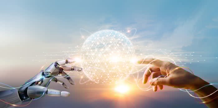 Image shows robot hand and human hand touching a digital globe.