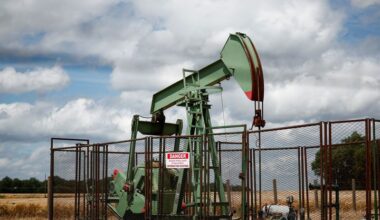 Oil eases from near 3-mth highs amid strong dollar ahead of economic data