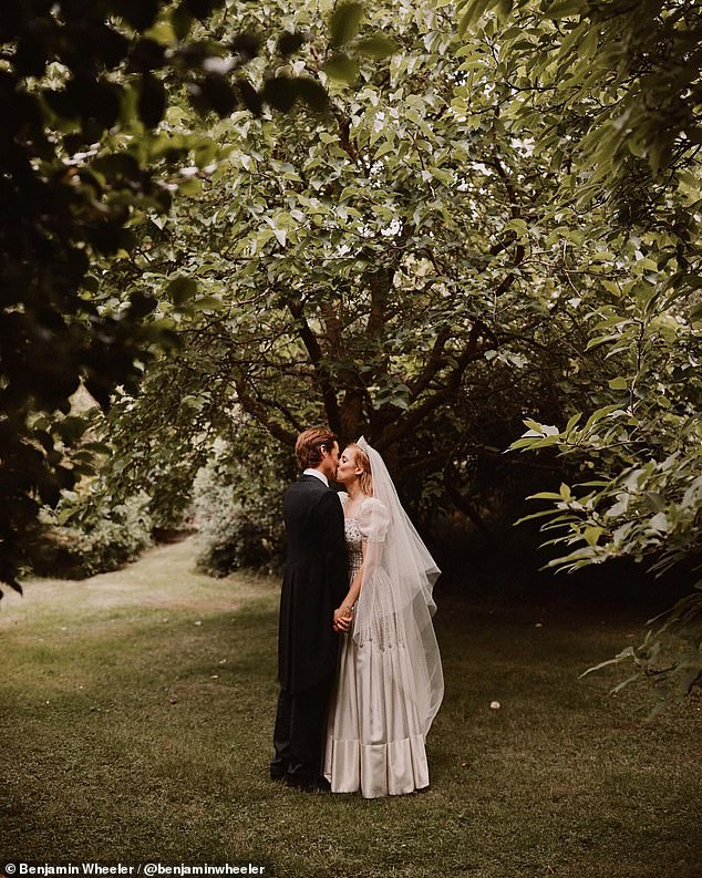 Princess Beatrice's husband Edoardo shared a previously unseen picture of them kissing at their wedding for their anniversary this year