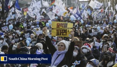 South Korea’s Yoon in court as investigators seek to extend detention