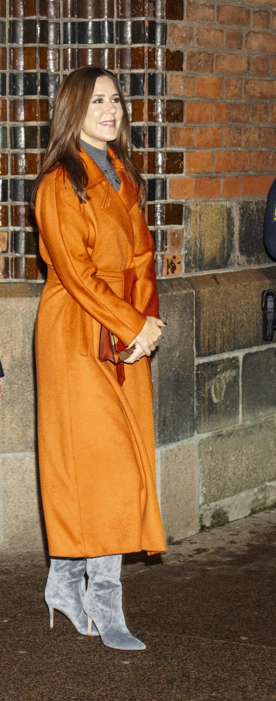 (LtoR) Princess Isabella of Denmark, Prince Vincent of Denmark and Queen Mary of Denmark leave after the Christmas Eve service at Aarhus Cathedral in Aarhus on December 24, 2024. Princess Isabella and Queen Mary (Photo by Thomas Traasdahl / Ritzau Scanpix / AFP) / Denmark OUT