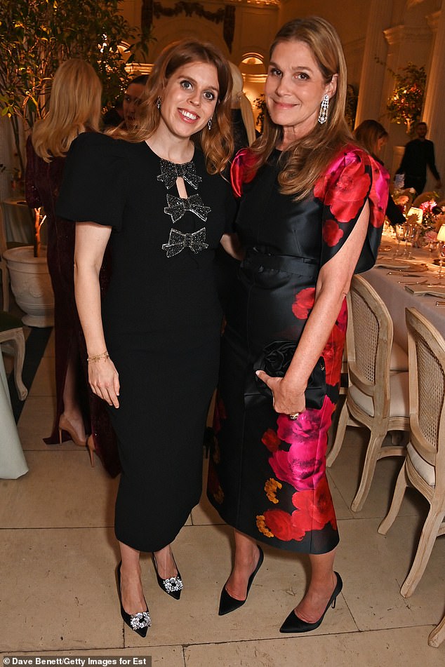 Dressed to impress in a statement black dress, Beatrice's (pictured with Aerin Lauder) ensemble featured a trio of bows running down from the neckline to the waist, giving the classic midi frock an elegant upgrade