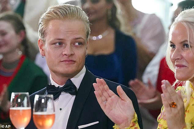 Pictured: Norway's Marius Borg Hoiby, left, and Crown Princess Mette-Marit, right, in Oslo, June 16, 2022