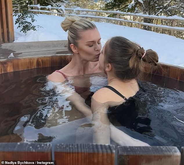 The pair were making the most of their picturesque surroundings during their stay at a remote winter chalet