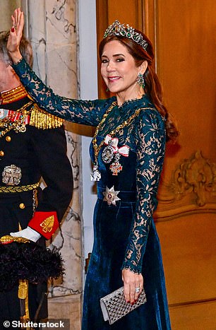 With her hair pinned into a half-up, half-down style, the Queen (pictured), 52, looked picture perfect as she stood next to her husband, 56, who wore a military outfit for the lavish occasion