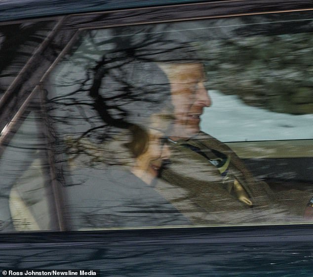 Charles and Lady Sarah Keswick, one of Camilla's six royal companions, looked cheerful as they made the journey