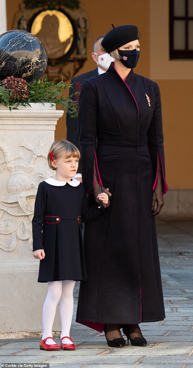 In 2020, Charlene marked National Day with a custom-made coat from the palace's atelier, sheer gloves by Cornelia James, a Christian Dior beret and Jimmy Choo kitten heels