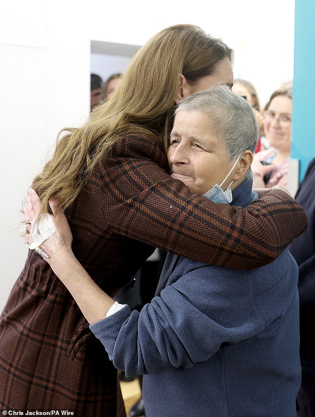 The Princess of Wales embraces Amanda Platell's friend Rebecca Mendlesohn on a cancer ward