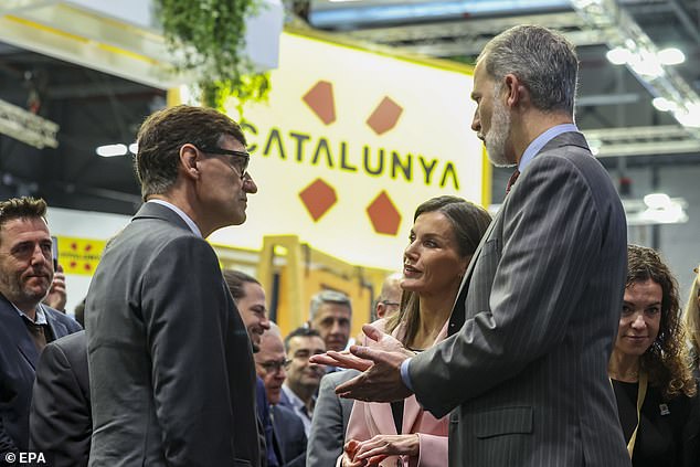 The Spanish royals stop to chat with Catalonia Government's President Salvador Illa
