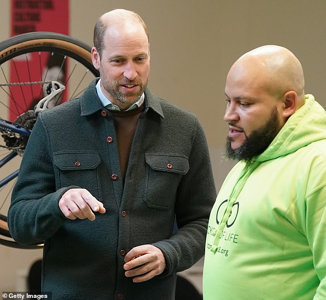 The 42-year-old put on a smart display in a green shirt jacket, brown jumper, and a pair of navy trousers