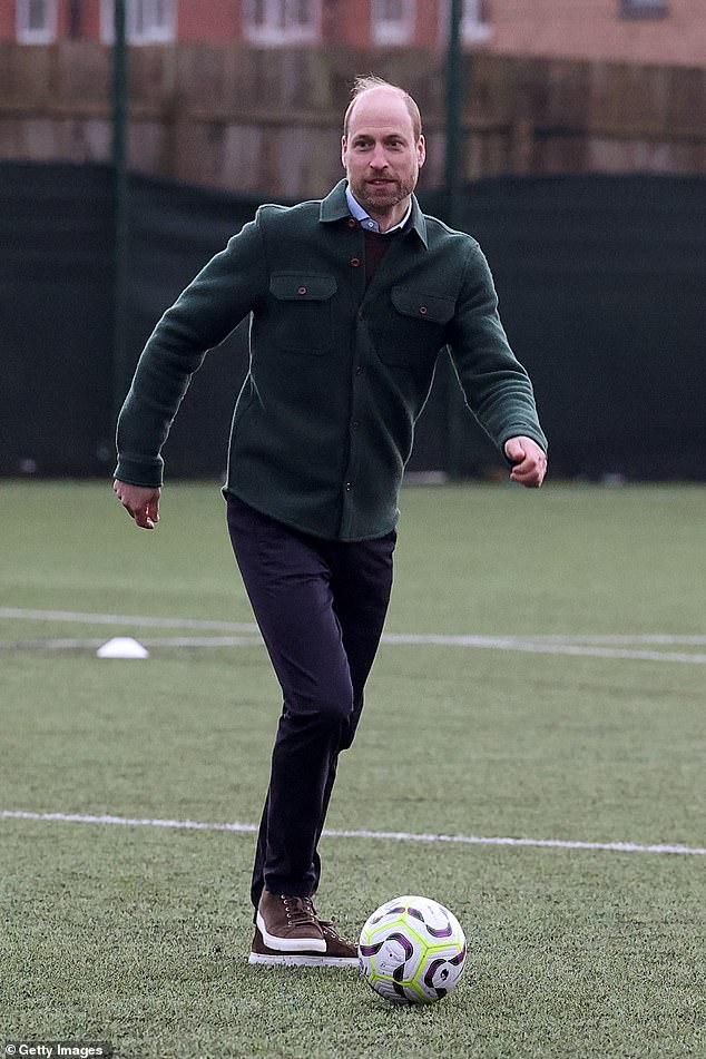 The Prince of Wales seemed to be having a ball as he joined in a football game during a visit to Merseyside today