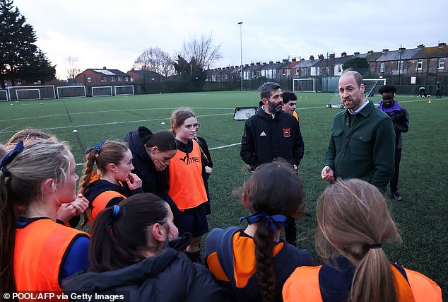 Prince William spoke to members of the young people's group after the match