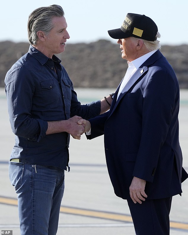 President Donald Trump talks with California Gov. Gavin Newsom after arriving on Air Force One at Los Angeles International Airport in Los Angeles, on Friday