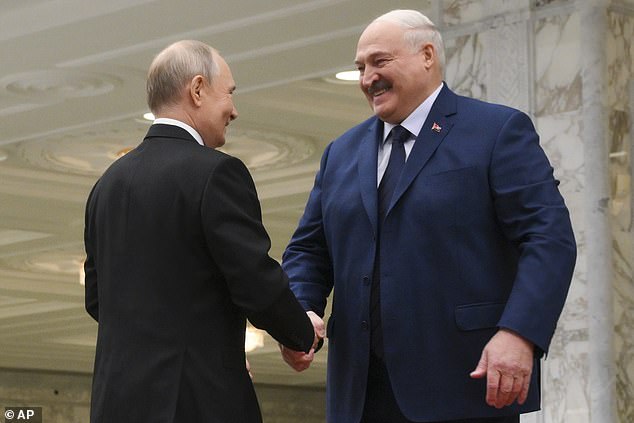 Vladimir Putin and Lukashenko shake hands. The country has remained staunchly loyal to Russia since it gained independence in 1991 from the Soviet Union
