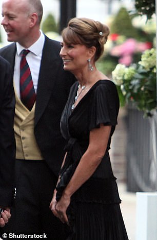 Carole wore the same earrings in 2011 for Kate and Prince William's wedding party