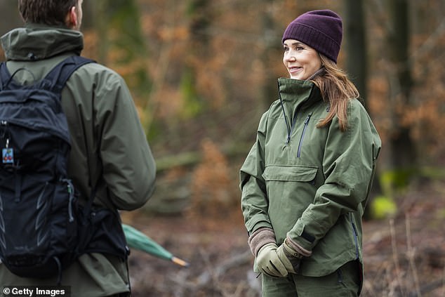 Mary met with several members of staff in the forest to celebrate the restoration work they have been doing and appeared to be enjoying herself