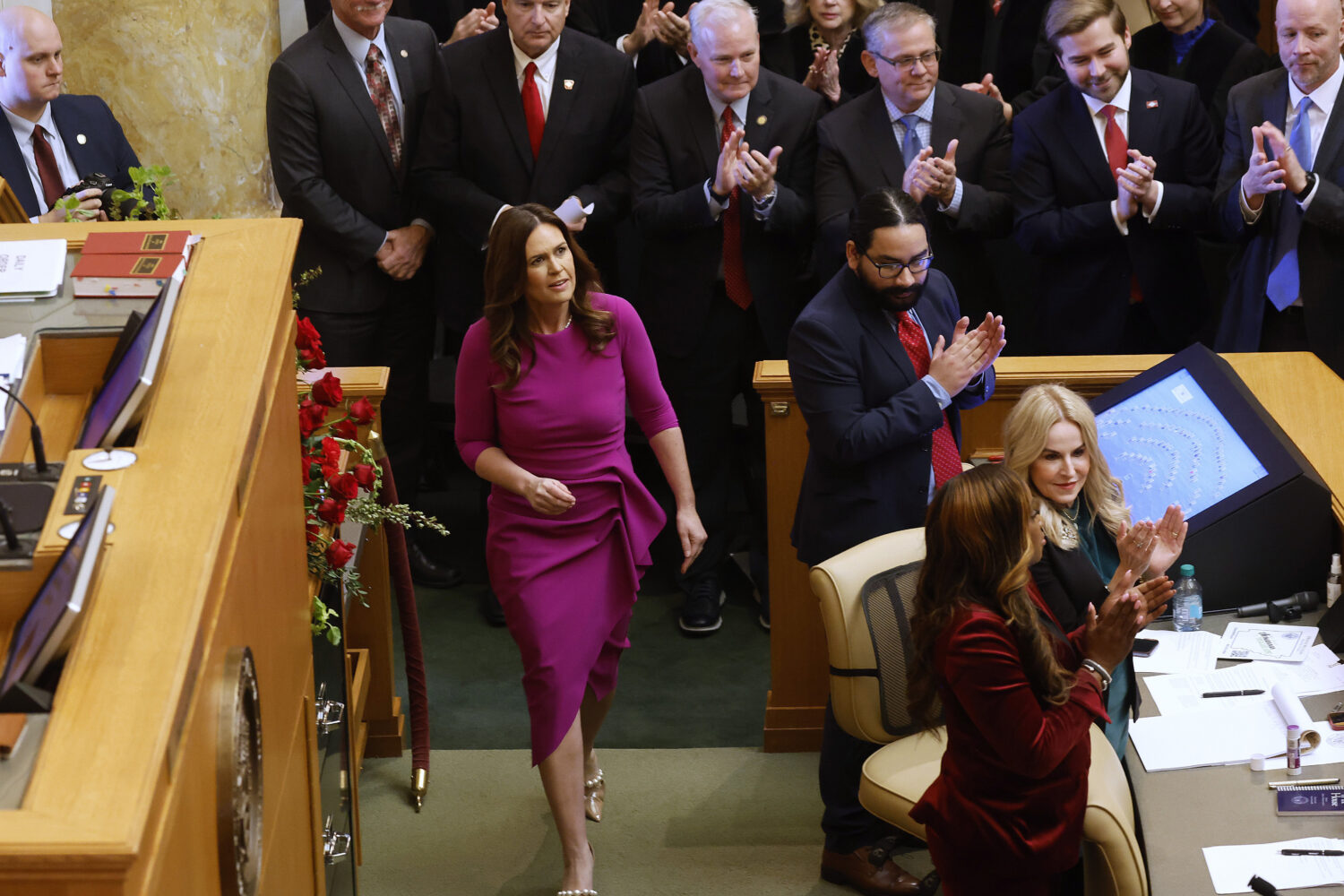 Gov. Sarah Huckabee Sanders is applauded as she walks to the podium before giving the State of the ...