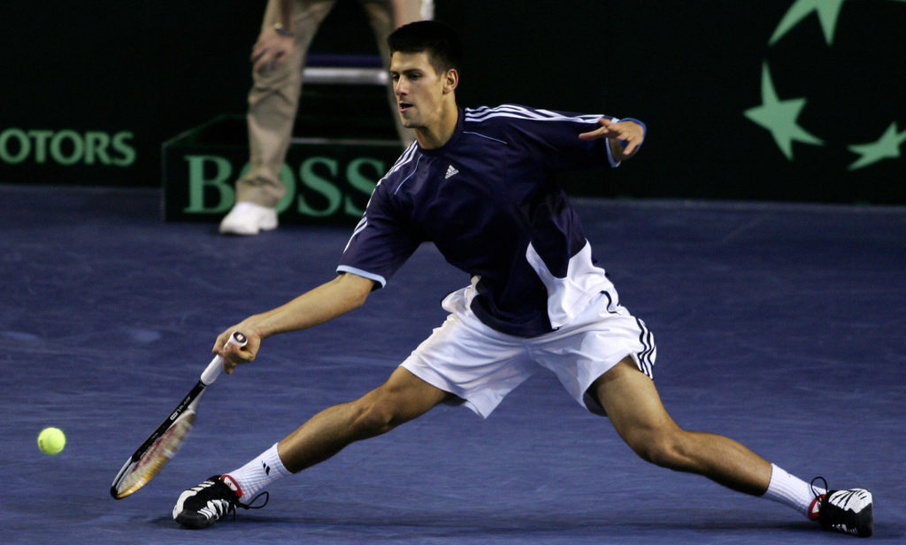 Novak Djokovic of Serbia and Montenegro vies with Great Britain's Greg Rusedski, on day three of the Second round, Europe Africa Zone Group 1Davis ...
