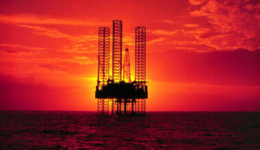A Devon-Pennzenergy drilling rig In the Gulf of Mexico pictured at sunset.
